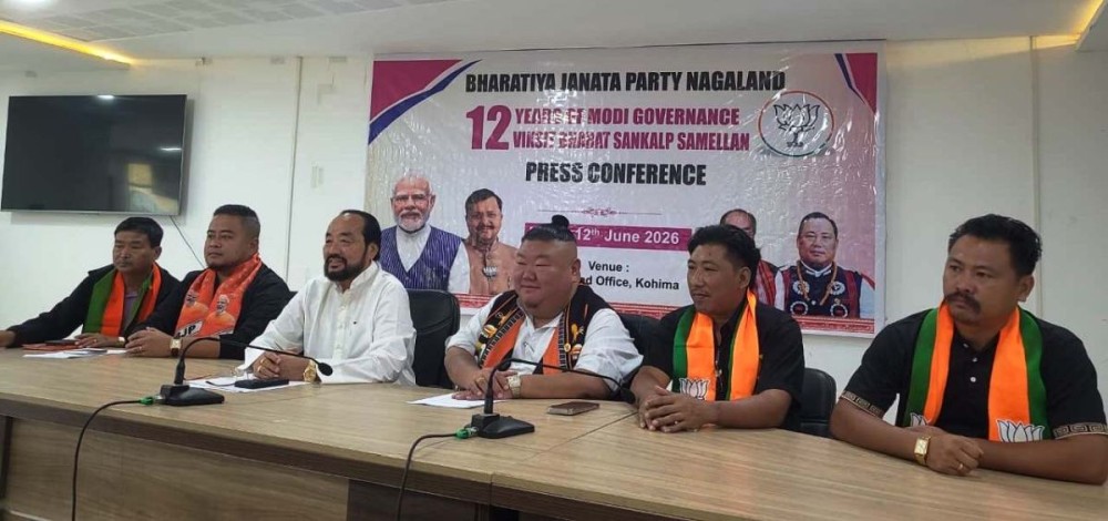 Temjen Imna Along, Y Patton, Doachier I Imchen with others during press conference in Kohima on June 12. (Morung Photo)